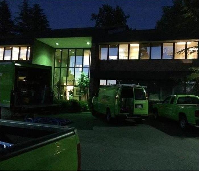 Office building with SERVPRO trucks out front